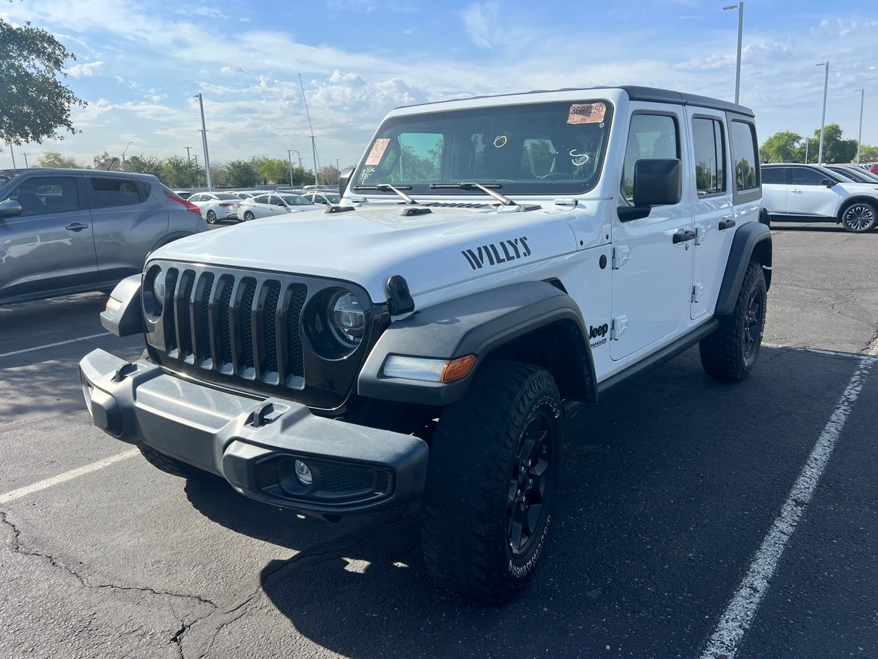 Used 2021 Jeep Wrangler Unlimited Willys with VIN 1C4HJXDG0MW713421 for sale in Peoria, AZ
