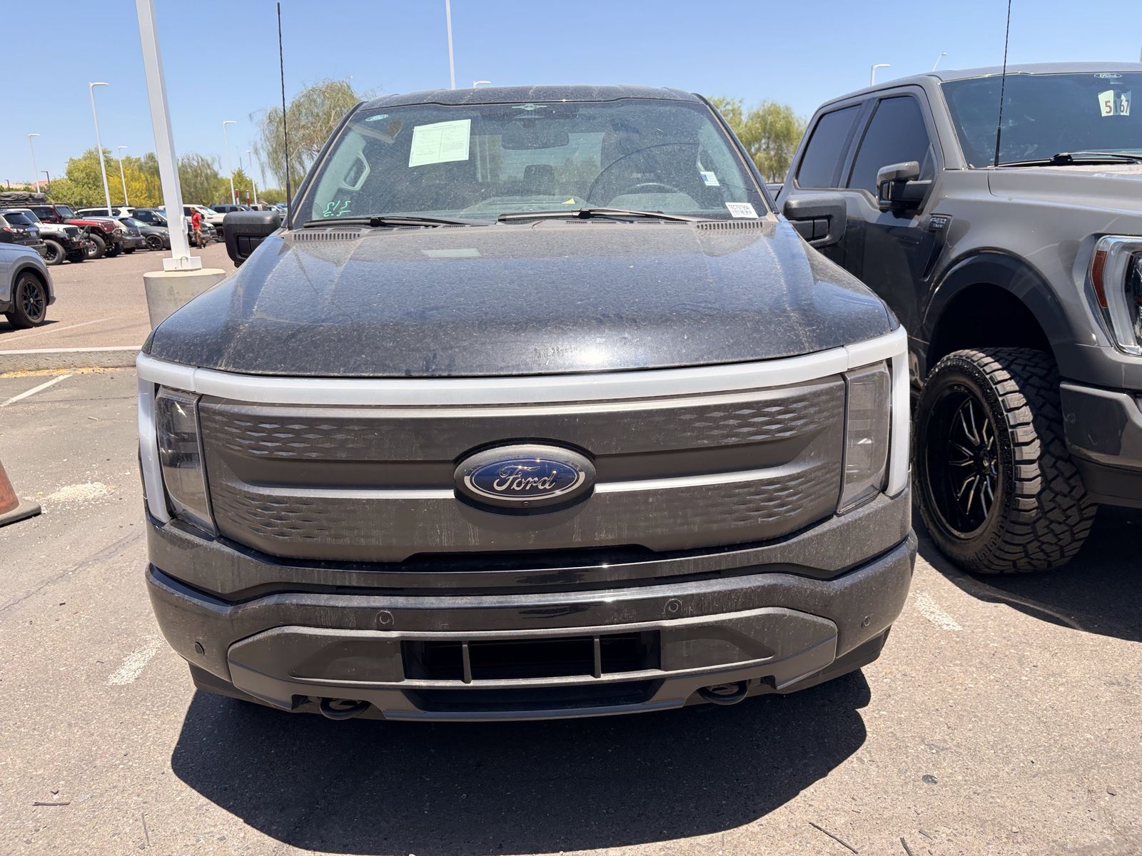 Certified 2023 Ford F-150 Lightning XLT with VIN 1FTVW1ELXPWG23078 for sale in Peoria, AZ