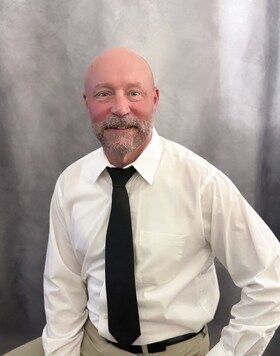 Staff member Dan Halliburton from ID_9e6e188ca46f