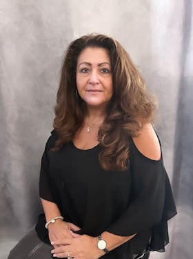 Staff member Melanie Passer from ID_73d10c8999eb