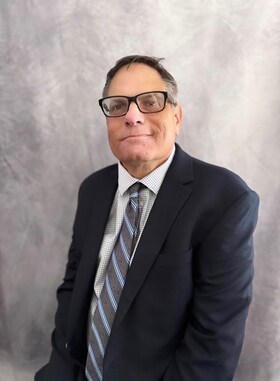 Staff member Evan Sussman from ID_9d105c3df8b0