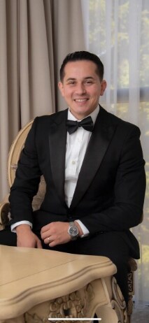 Staff member RJ Gizha from ID_c88d3e6b6cc7