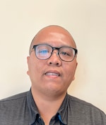 Staff member Randy Naguit from ID_e435e1835401