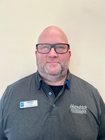 Staff member Aaron McLean from ID_d76cd456c479