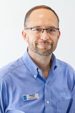 Staff member Andrew Gloc from ID_d76cd456c479