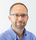 Staff member Andrew Gloc from ID_d76cd456c479