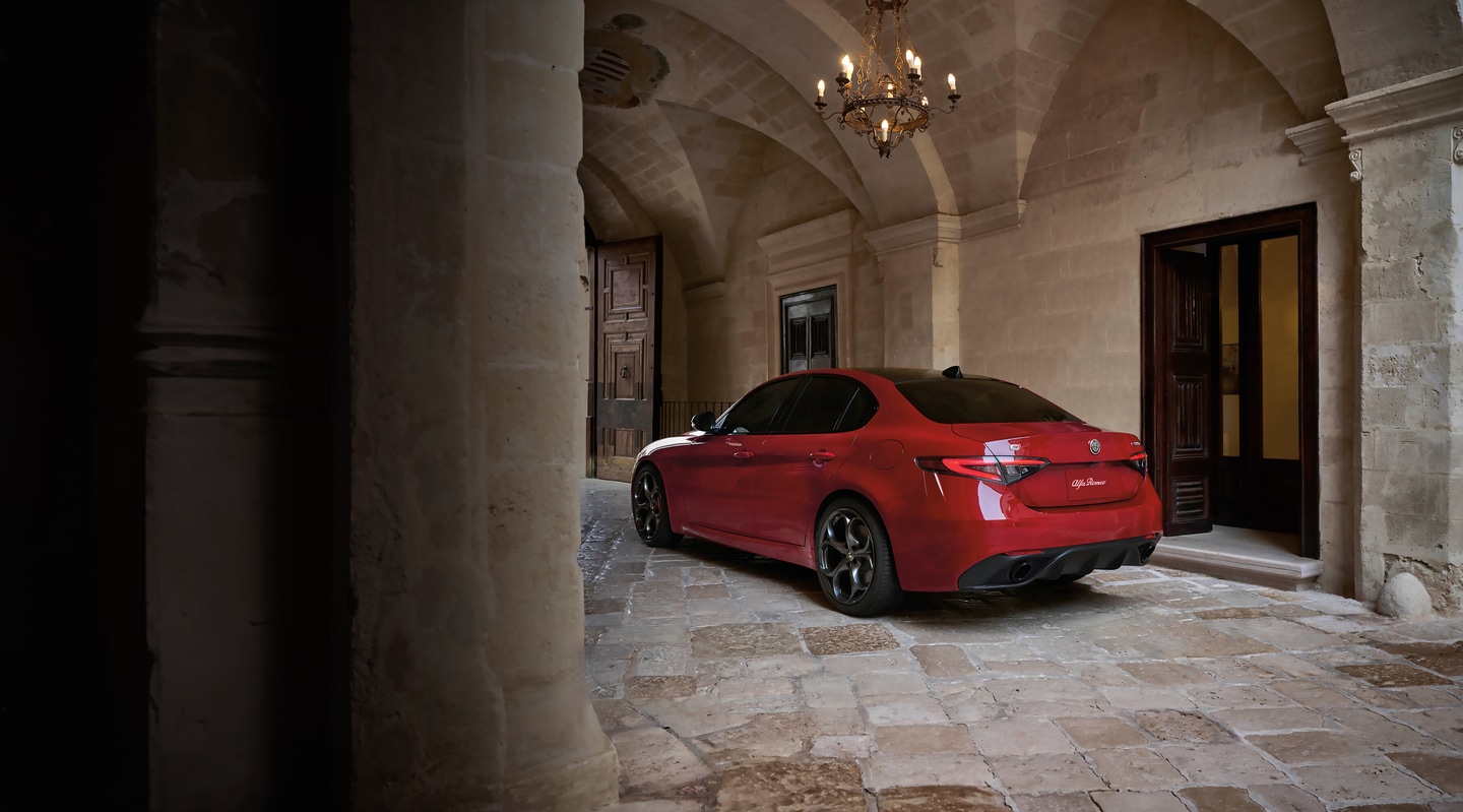  Person cheerfully signing documents.