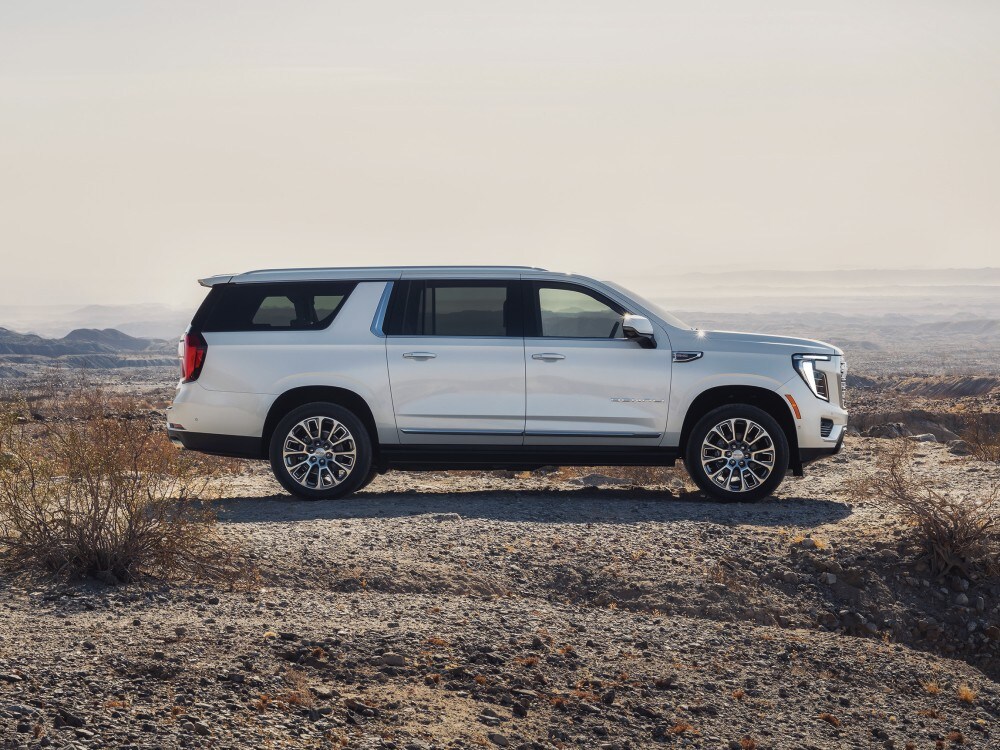  Person cheerfully signing documents.