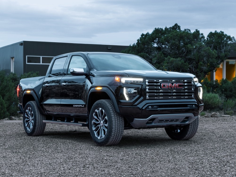  Person cheerfully signing documents.