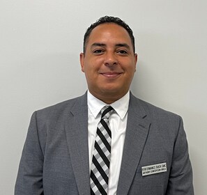 Staff member Anthony Concepion-Brea from ID_27f12e53c952