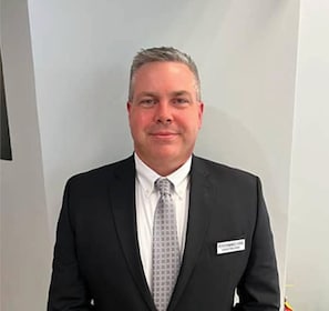 Staff member DOUG RALEIGH from ID_5b7185f88ac9