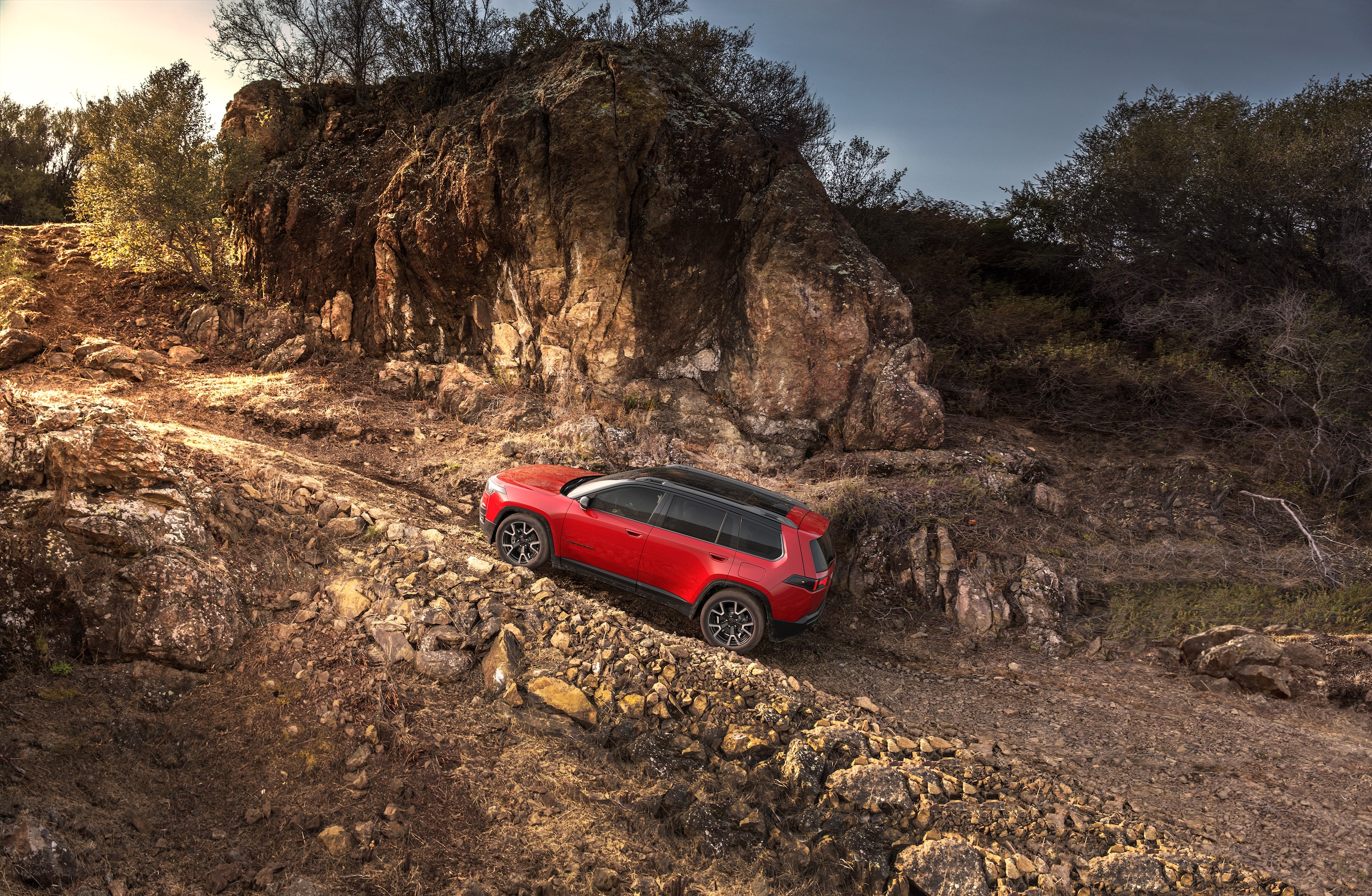  Person cheerfully signing documents.