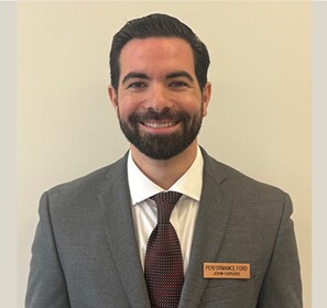 Staff member John Caruso from ID_60e7e4