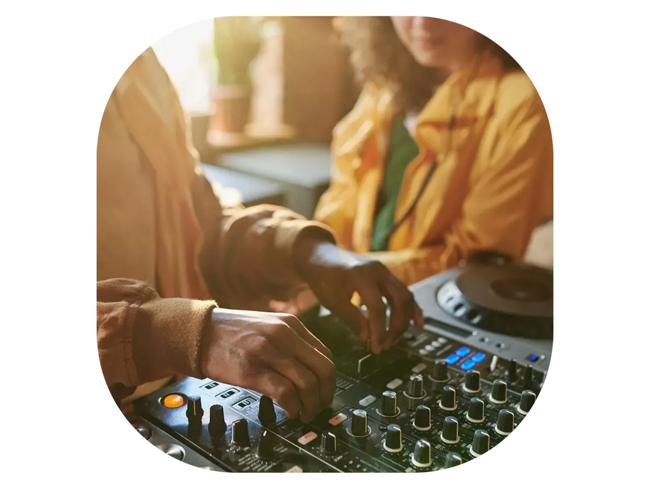 Ford Fathom DJ mixing music on an audio console.