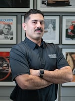 Staff member Kenny Mendez from ID_70a10899e7fa