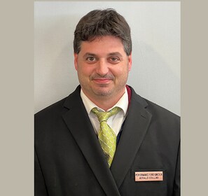 Staff member Gerry Collins from ID_79c686bb6799