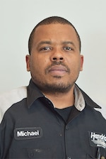 Staff member Michael Rhodes from ID_6f3bd3e52697