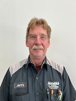 Staff member Jerry Holmes from ID_6f3bd3e52697