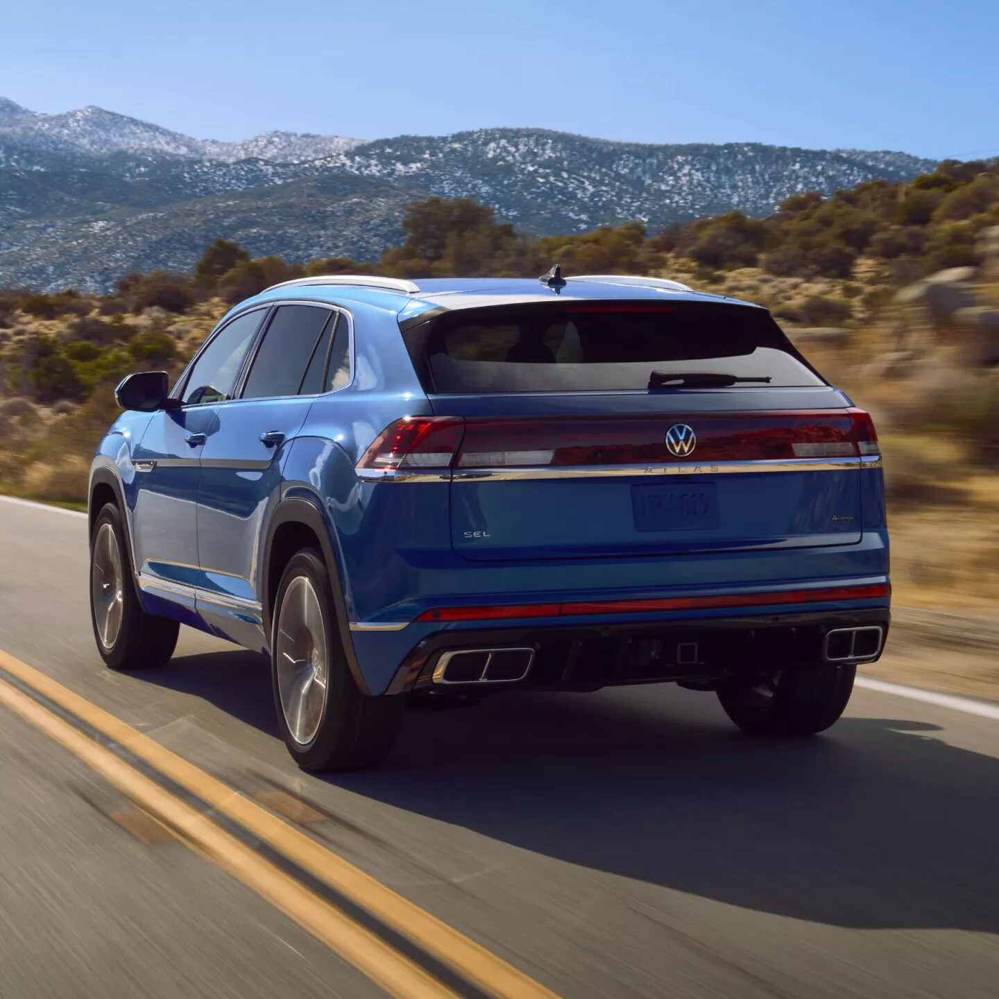  Person cheerfully signing documents.