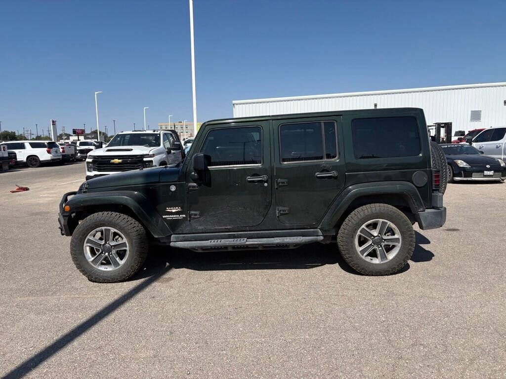 Used 2012 Jeep Wrangler Unlimited Sahara SUV