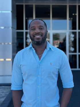 Staff member Glennard Tilley from ID_d03db2e30e0f
