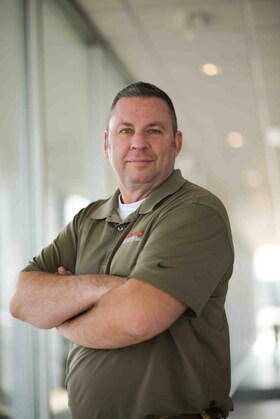 Staff member John Eisenreich from ID_46e2e9ad4236