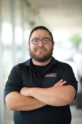 Staff member Eric Scott from ID_46e2e9ad4236