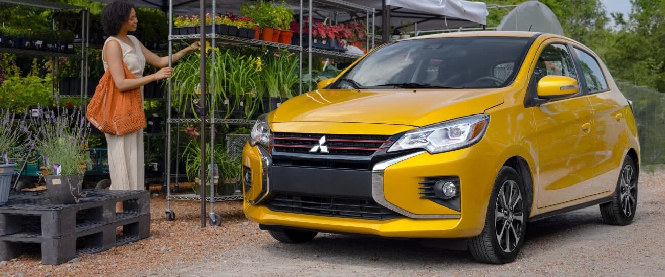 2023-mitsubishi-mirage-sand-yellow-metallic-parked.jpg