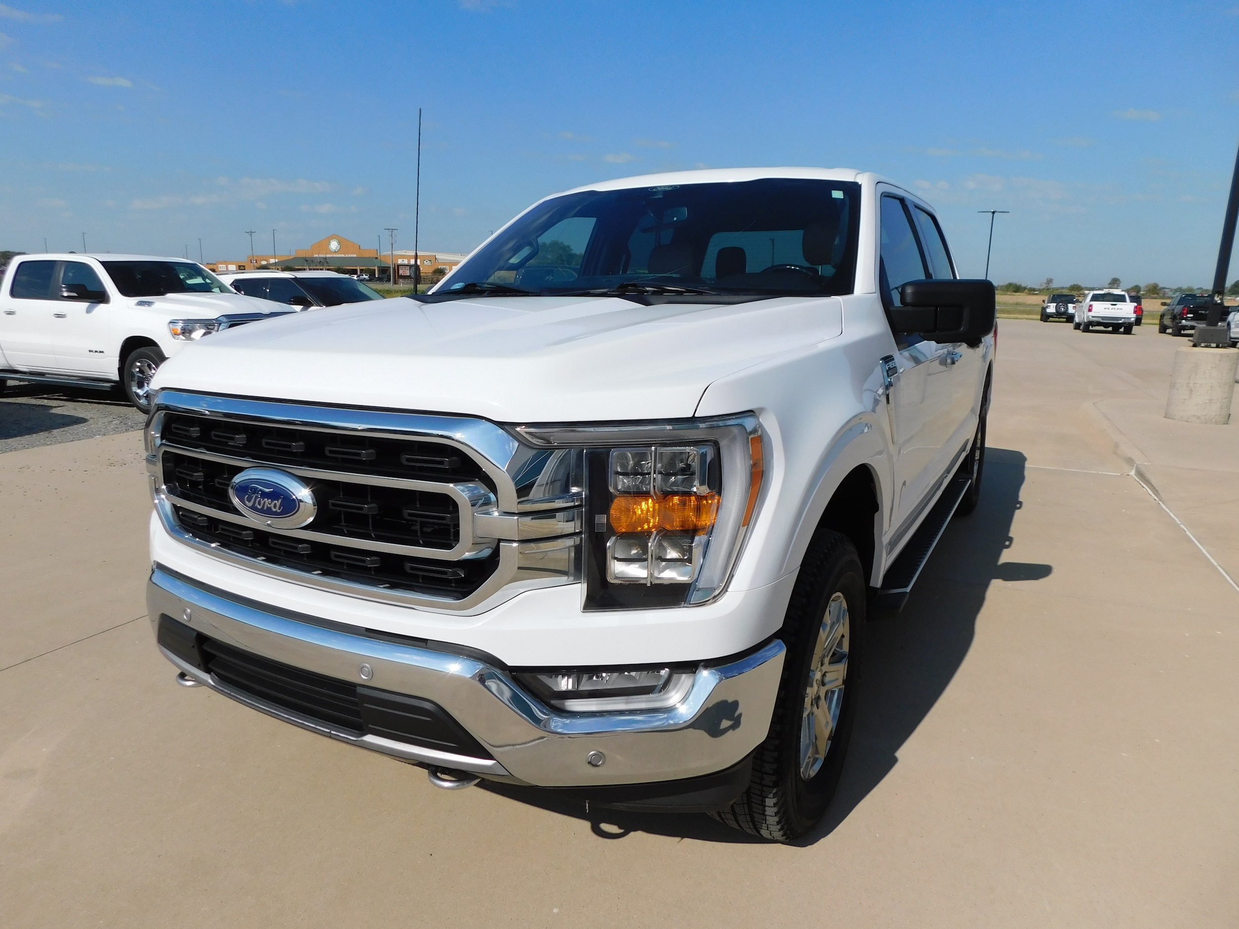 Used 2021 Ford F-150 XLT with VIN 1FTFW1E52MKE52030 for sale in Stuttgart, AR