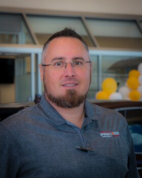 Staff member Justin Reese from ID_1284265e267c