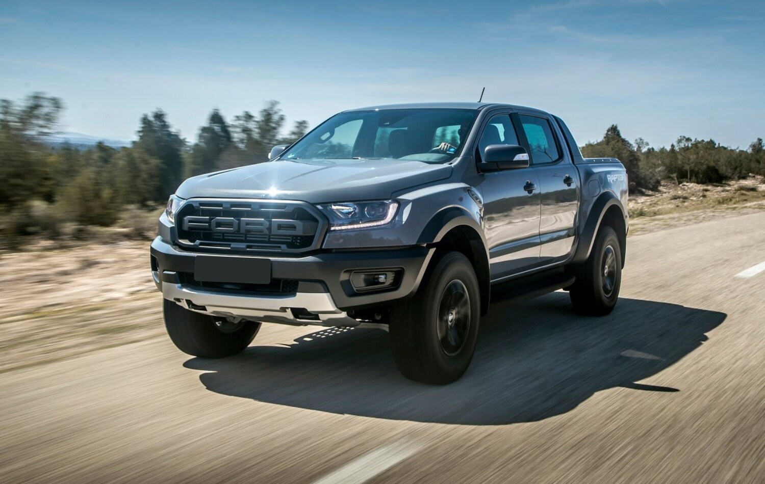 New 2021 Ford Ranger Raptor Engine Performance.png New Ford Ranger Raptor speeding down an open road with the 2.3L turbo engine roaring as it passes by