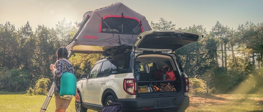 A Ford Bronco Sport with a tent topper attached.