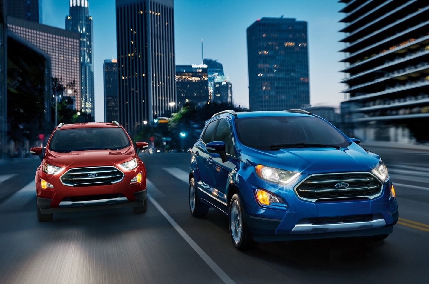 two-ford-eco-sports-driving-through-city