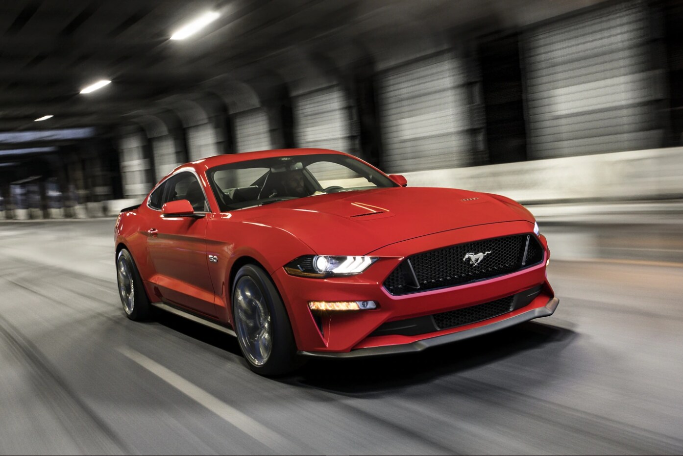 2022-ford-mustang-driving-on-city-road