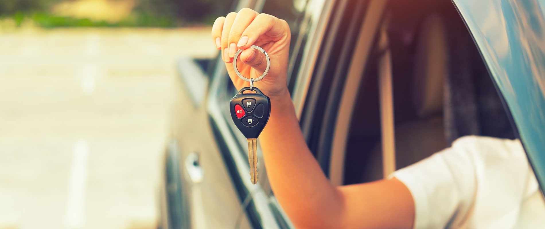 Driver showing off the keys to their new Ford truck
