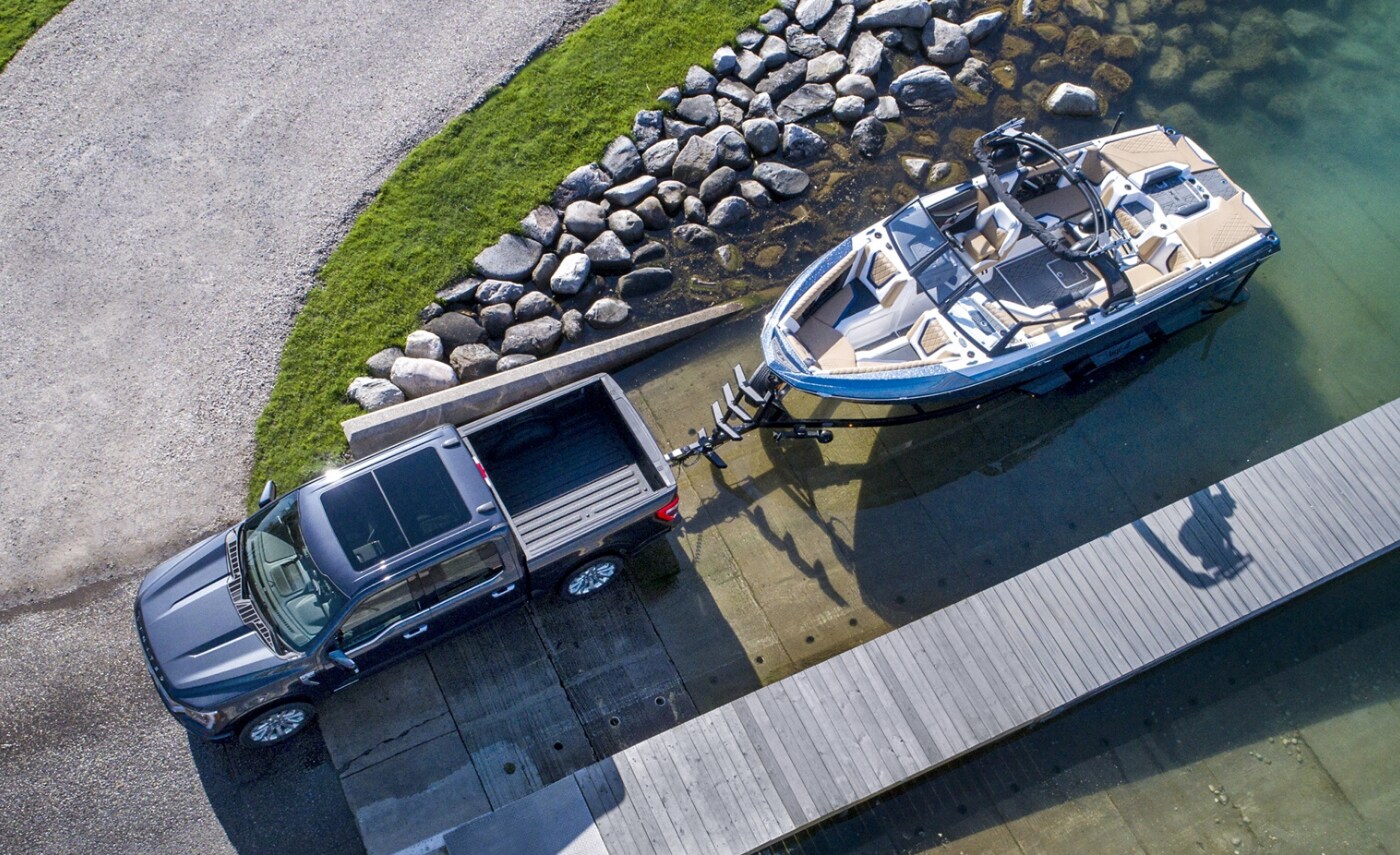 2021 Ford F-150 Truck (3).png Aerial view of the new 2021 Ford F-150 towing a boat out of water off a boat ramp