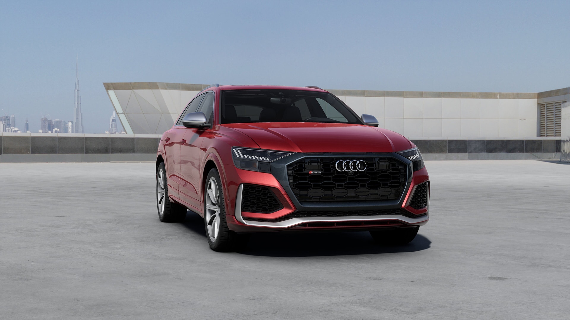 An Audi Q8 parked on top of a building in Dubai