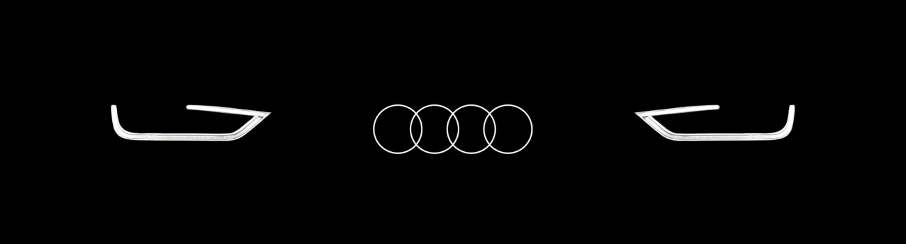 Vector image of the outline of Audi headlights with an Audi logo in the middle