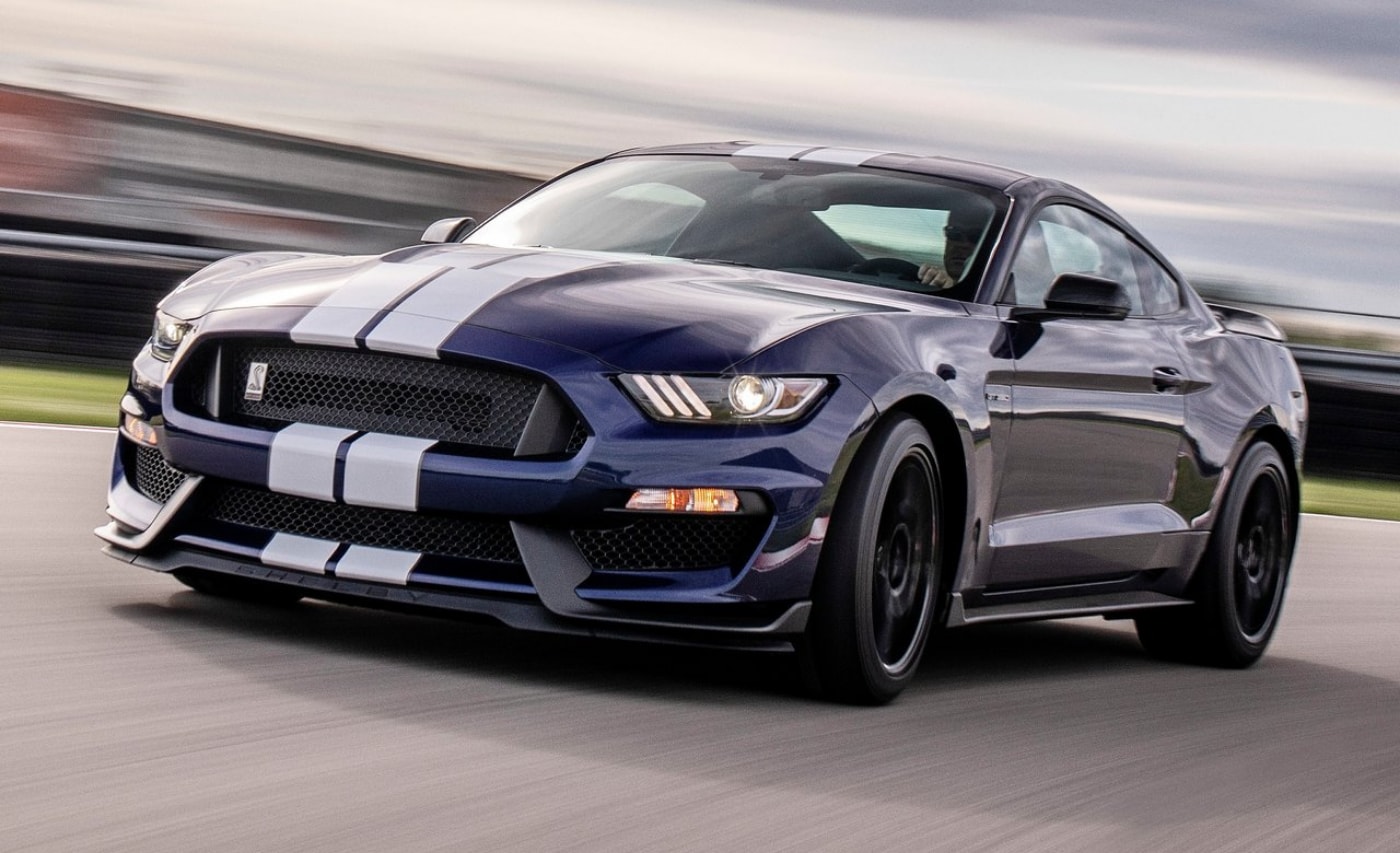 2020 Ford Mustang Shelby GT350 driving fast around a race track