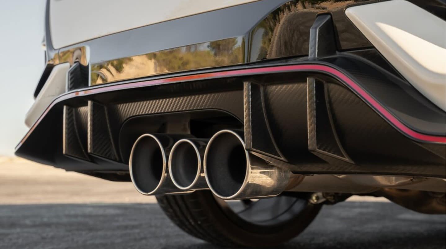 close up view of the rear exhaust on a new 2022 Honda Civic Type R