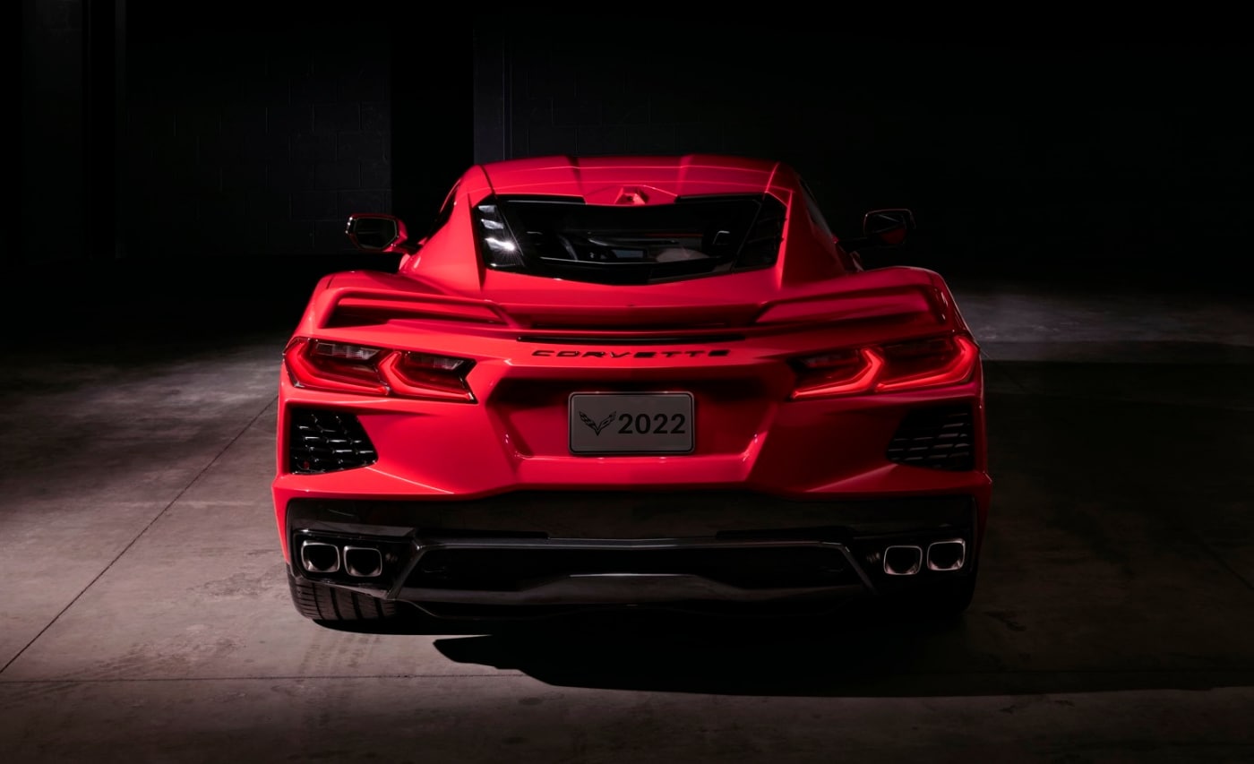 Rear exterior view of a red 2022 mid-engine Chevy Corvette Z06