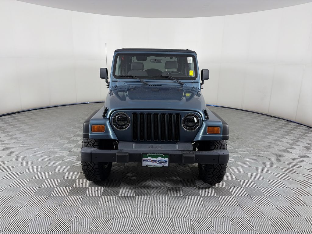 Used 1999 Jeep Wrangler SPORT with VIN 1J4FY19S9XP415990 for sale in Denver, CO