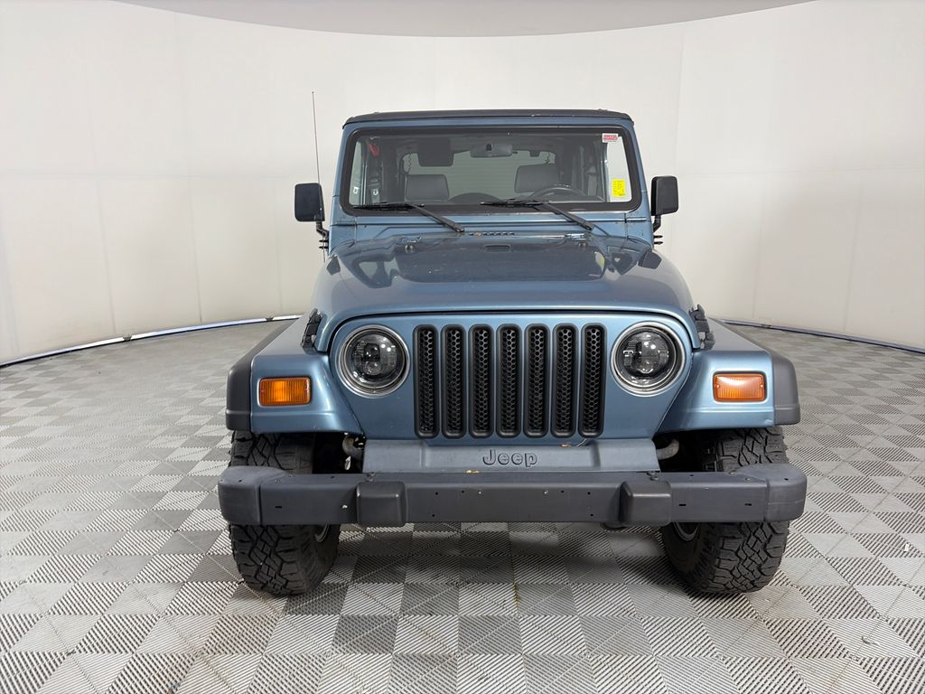 Used 1999 Jeep Wrangler SPORT with VIN 1J4FY19S9XP415990 for sale in Denver, CO