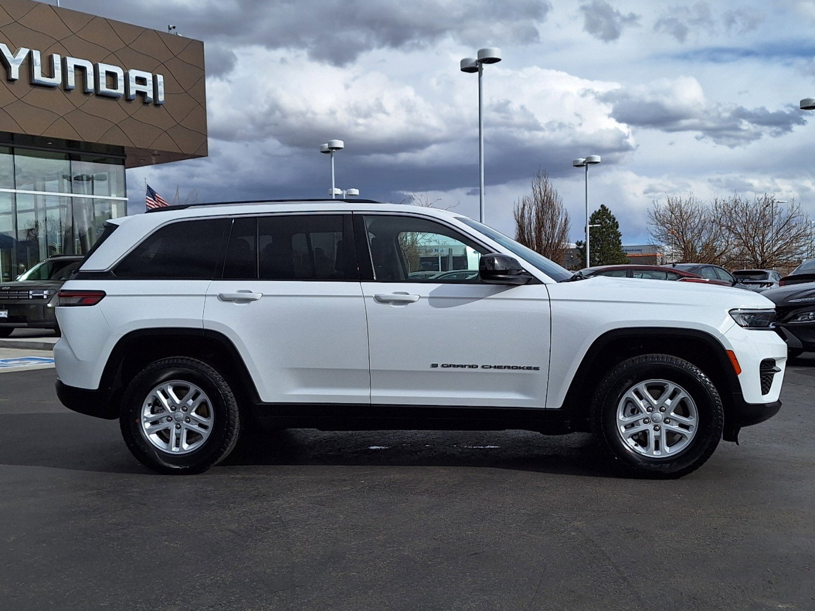 Used 2023 Jeep Grand Cherokee Laredo with VIN 1C4RJHAGXPC514462 for sale in Denver, CO