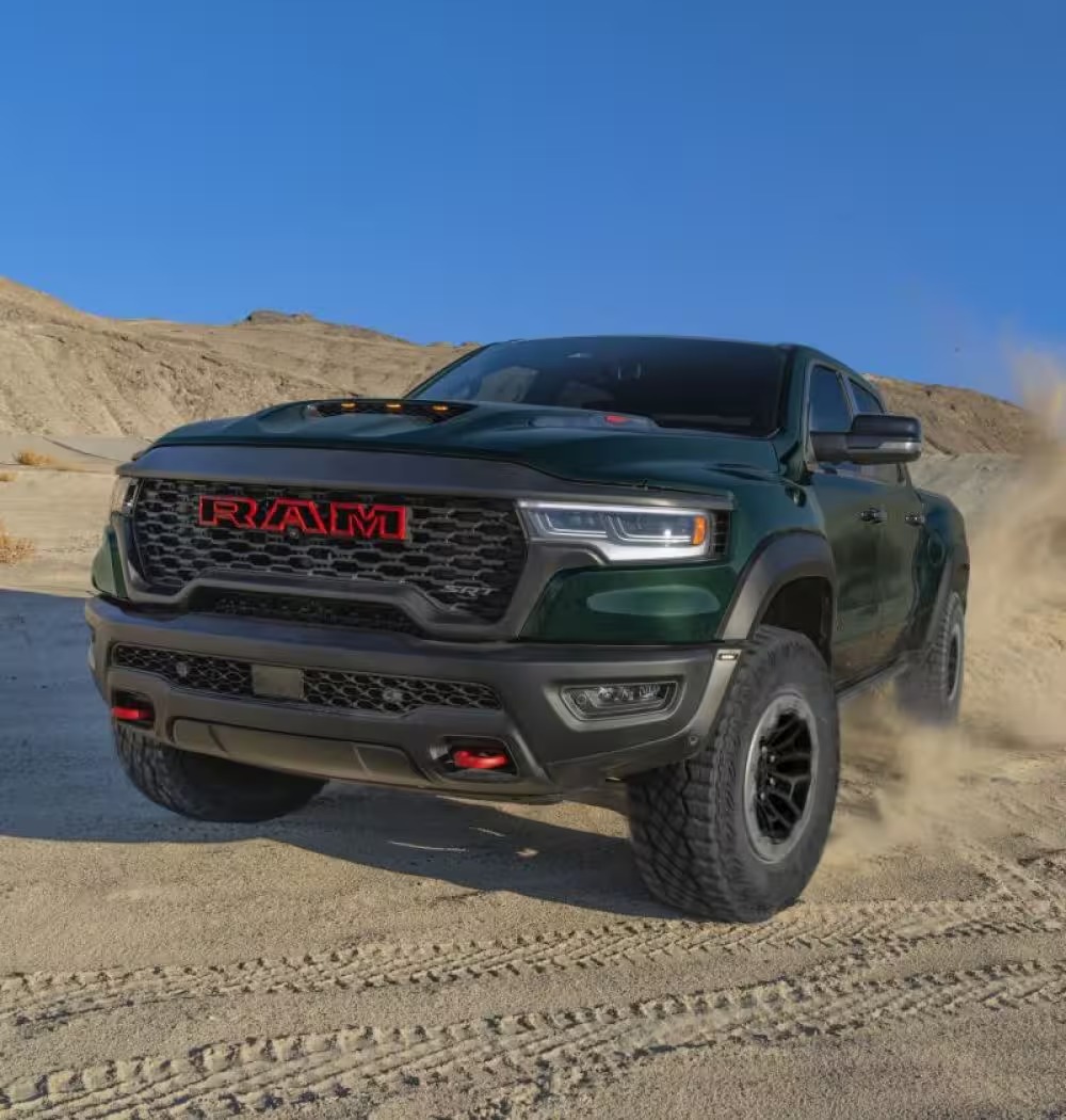 2027 Ram 1500 SRT TRX kicking up sand in the desert