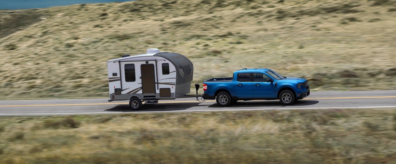 2025 Ford Maverick towing a teardrop trailer.