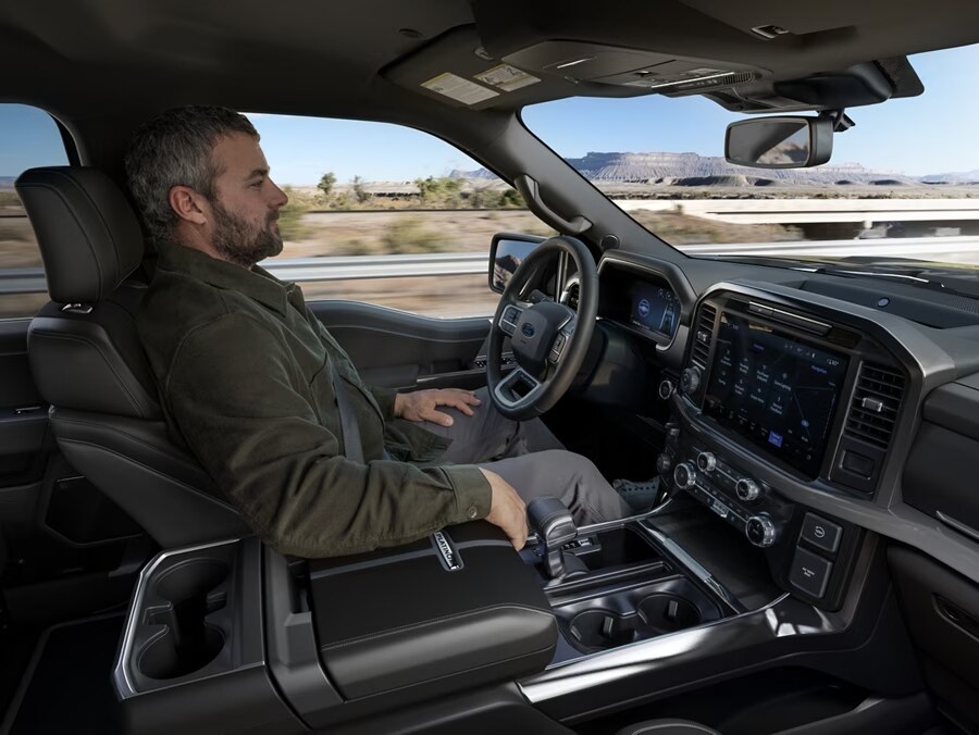 2024 F-150® Raptor R™ being driven in the desert kicking clouds of sand