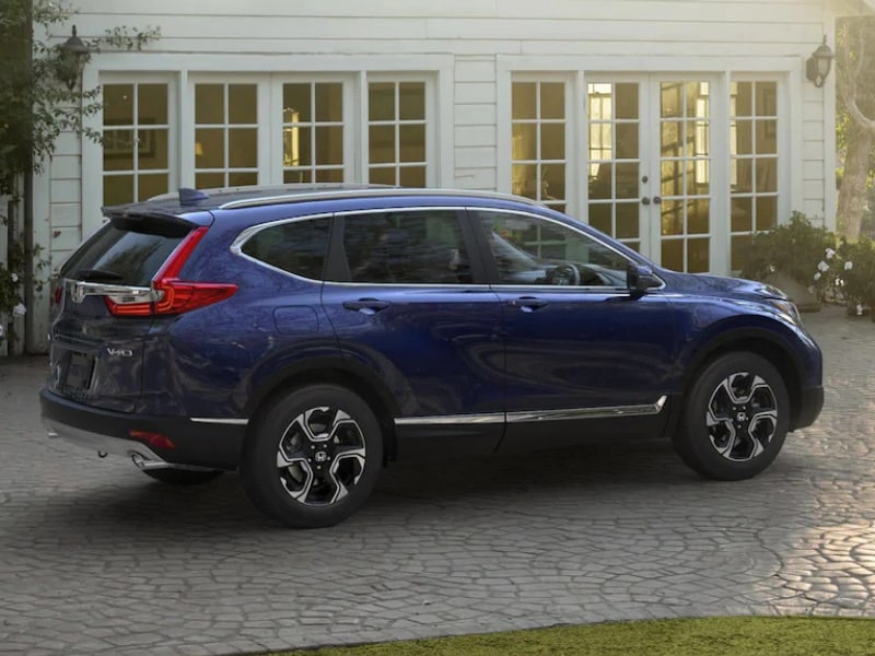 Exterior of a blue 2019 Honda CR-V parked in a driveway