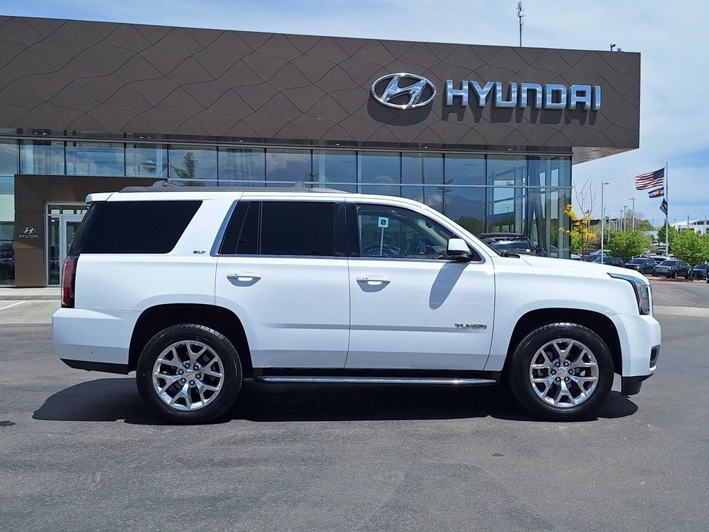 Used 2016 GMC Yukon SLT with VIN 1GKS1BKC1GR249992 for sale in Colorado Springs, CO