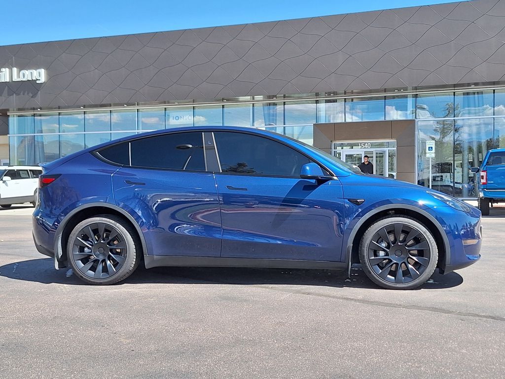 Used 2024 Tesla Model Y Long Range with VIN 7SAYGDEE4RF981834 for sale in Colorado Springs, CO